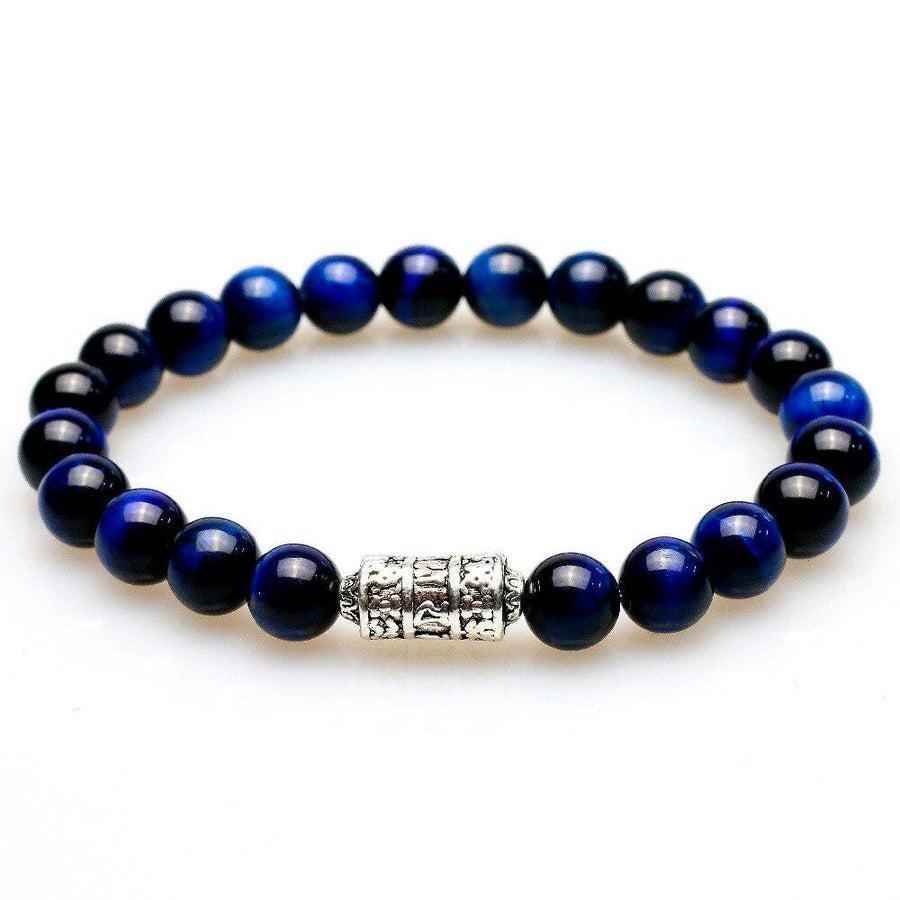 Bracelet en perles bleues, détail du totem bouddhiste