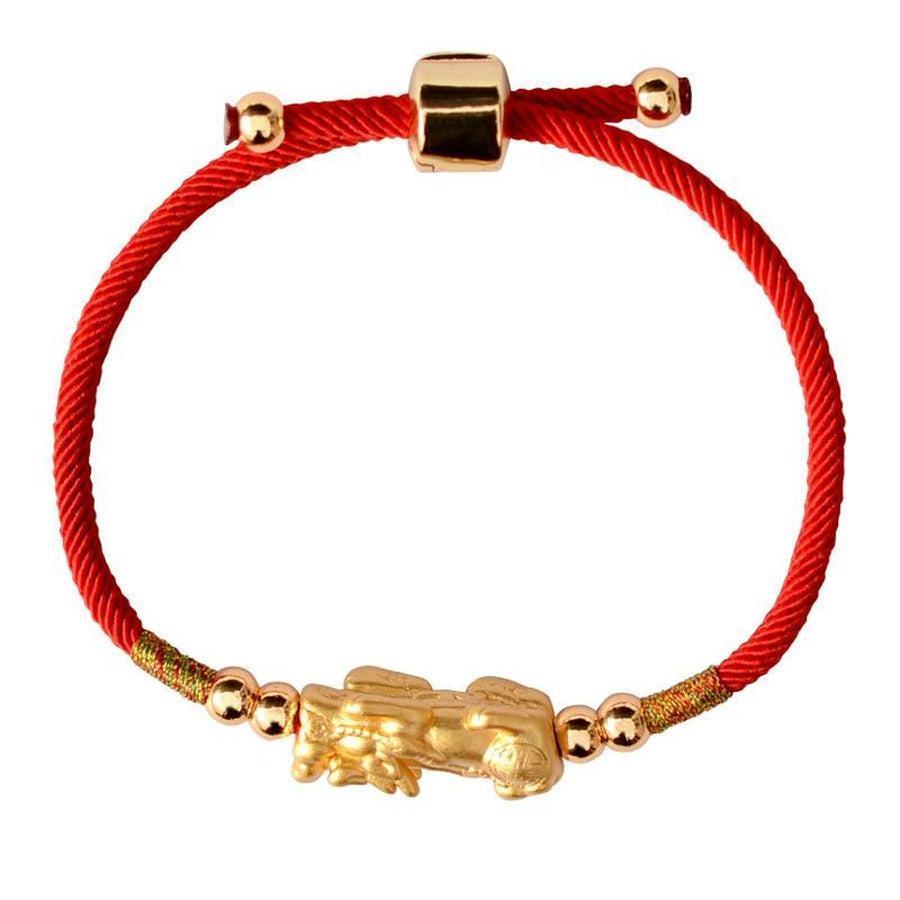 Bracelet Pi Xiu en argent et or sur fond blanc
