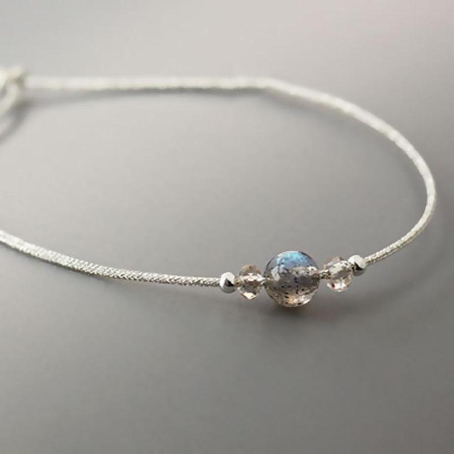 Bracelet avec pierre de lune et cordon tressé ajustable