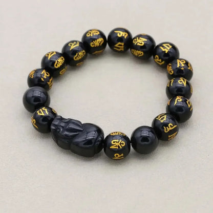 Bracelet artisanal en obsidienne noire, perles polies