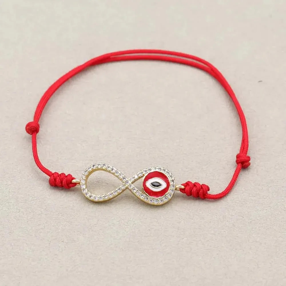 Bracelet porte-bonheur rouge, symboles spirituels