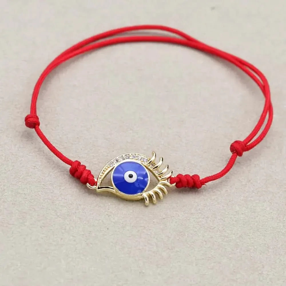 Bracelet ajustable en corde rouge avec symboles