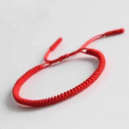 Bracelet Porte-Bonheur Tressé à la Main | Artisanat Bouddhiste et Ajustable