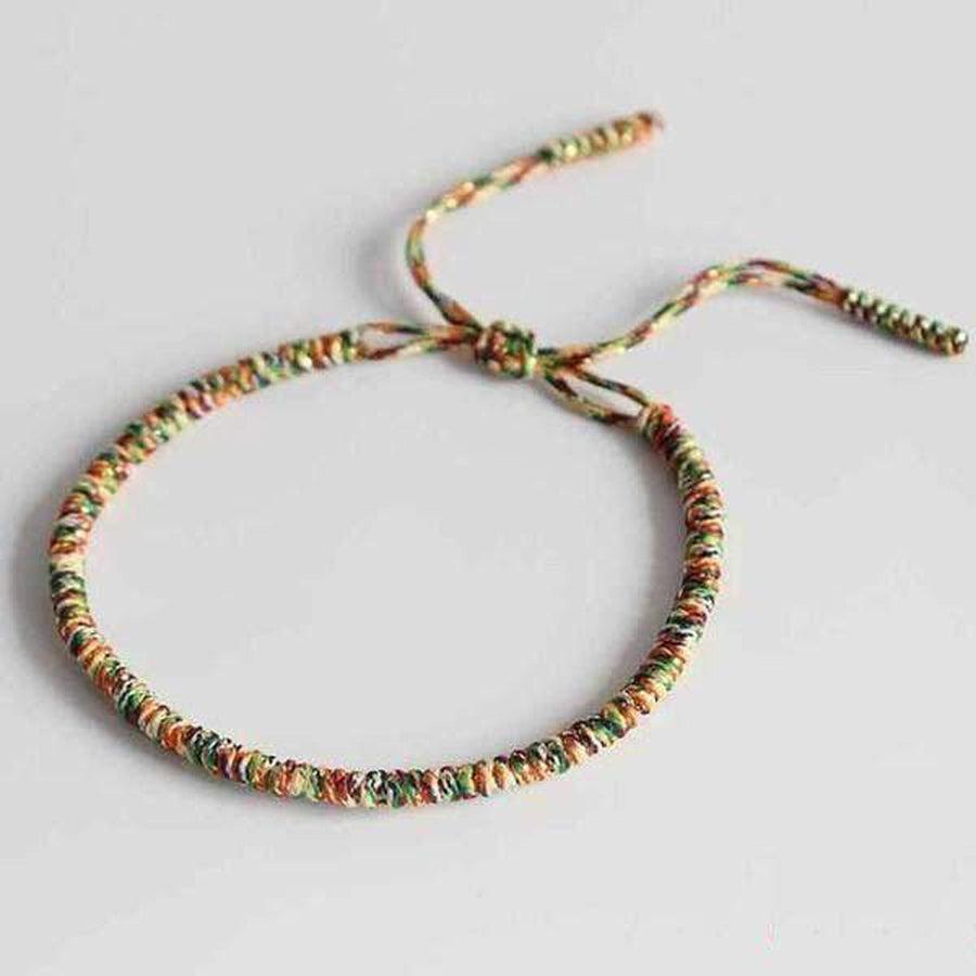 Bracelet Porte-Bonheur Tressé à la Main | Artisanat Bouddhiste et Ajustable