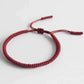 Bracelet Porte-Bonheur Tressé à la Main | Artisanat Bouddhiste et Ajustable
