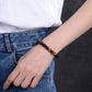 Bracelet Œil de tigre montrant différentes tailles de perles