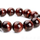 Bracelet Œil de tigre rouge sur fond blanc