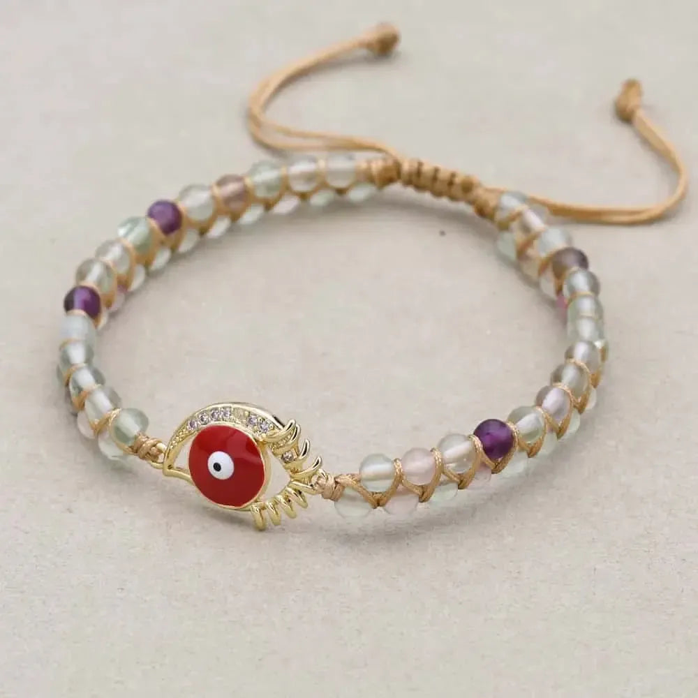 Charms infini et mauvais œil sur bracelet en fluorite