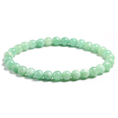 Détail des nuances de vert sur les perles de jade