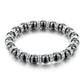 Bracelet en hématite et cristal sur fond blanc