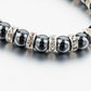 Vue latérale du bracelet montrant les détails des pierres