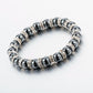 Bracelet en hématite et cristal avec reflets lumineux