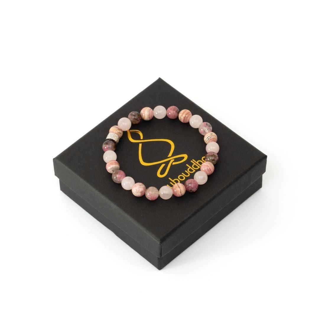 Gros plan sur les perles de Rhodonite, Rhodochrosite et Quartz Rose
