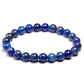 Vue latérale du bracelet en Lapis Lazuli sur fond blanc