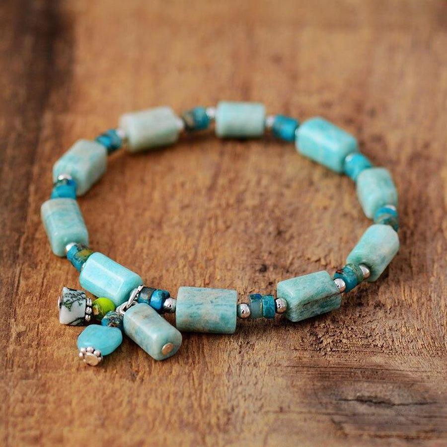 Bracelet en amazonite avec perles argentées et pendentifs