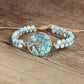 Bracelet en amazonite avec symbole arbre de vie en gros plan