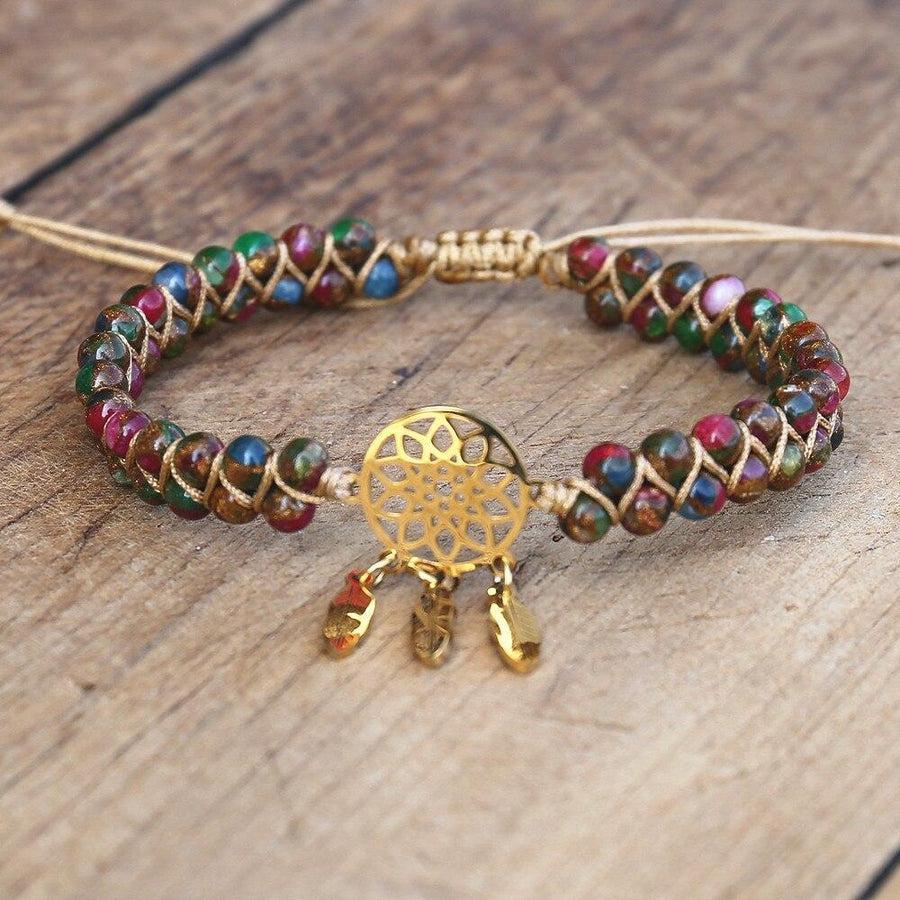Bracelet Shamballa avec médaille attrape-rêve et plumes