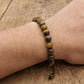 Bracelet Shamballa en Œil de Tigre sur fond blanc