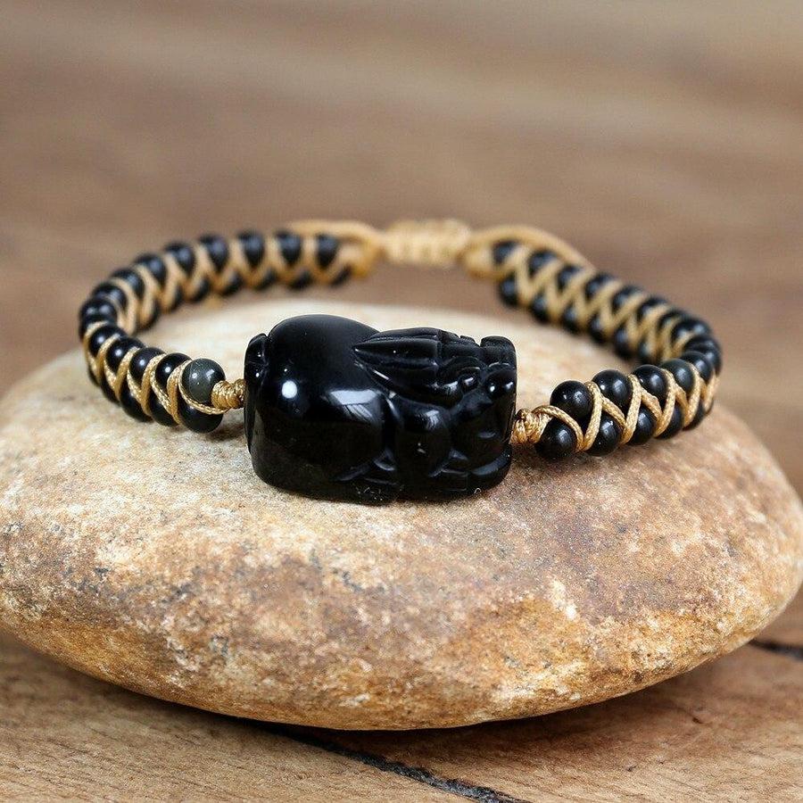 Bracelet en obsidienne avec perle Pixiu vue de côté