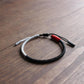 Bracelet Shamballa tibétain posé sur une surface claire