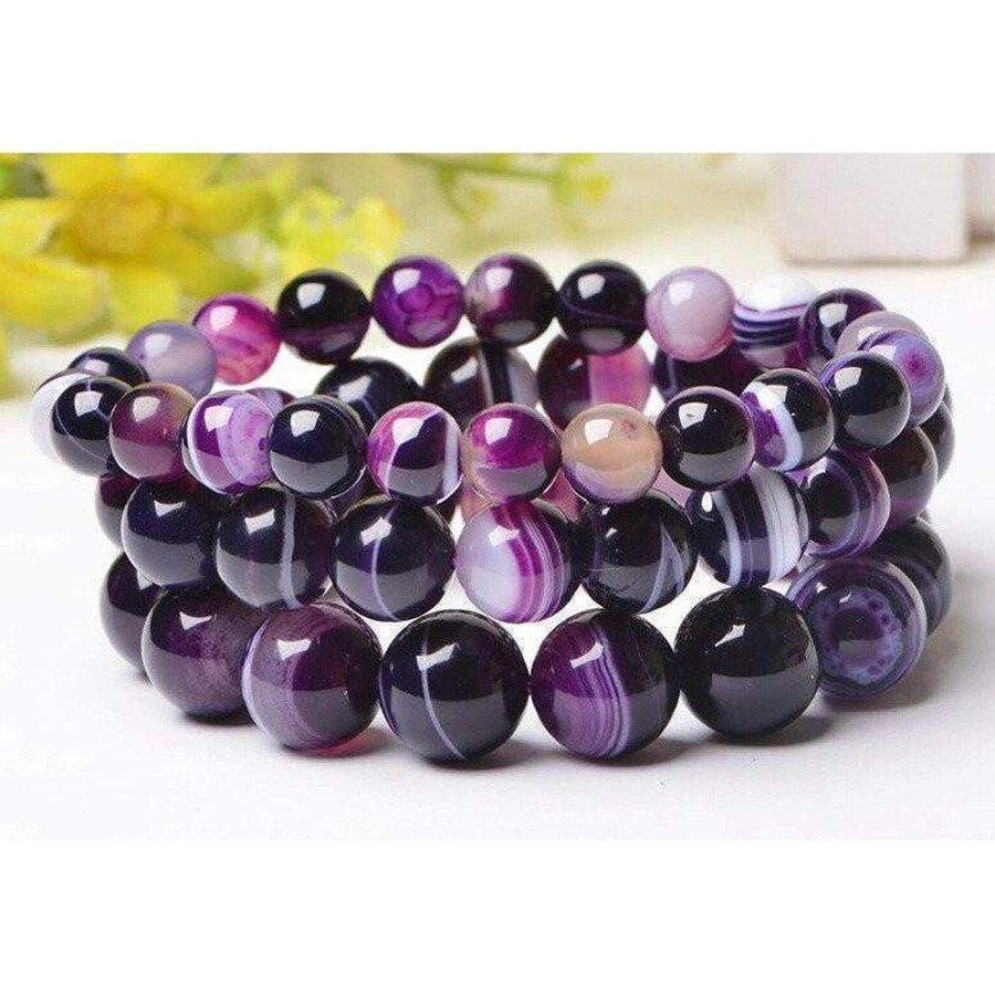 Détail des motifs naturels sur les perles d'agate