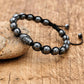 Vue latérale du bracelet Bouddha en perles d'hématite