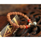 Bracelet tibétain avec onyx rouge et perles de Rudraksha