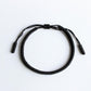 Bracelet tibétain noir avec nœud coulissant ajustable