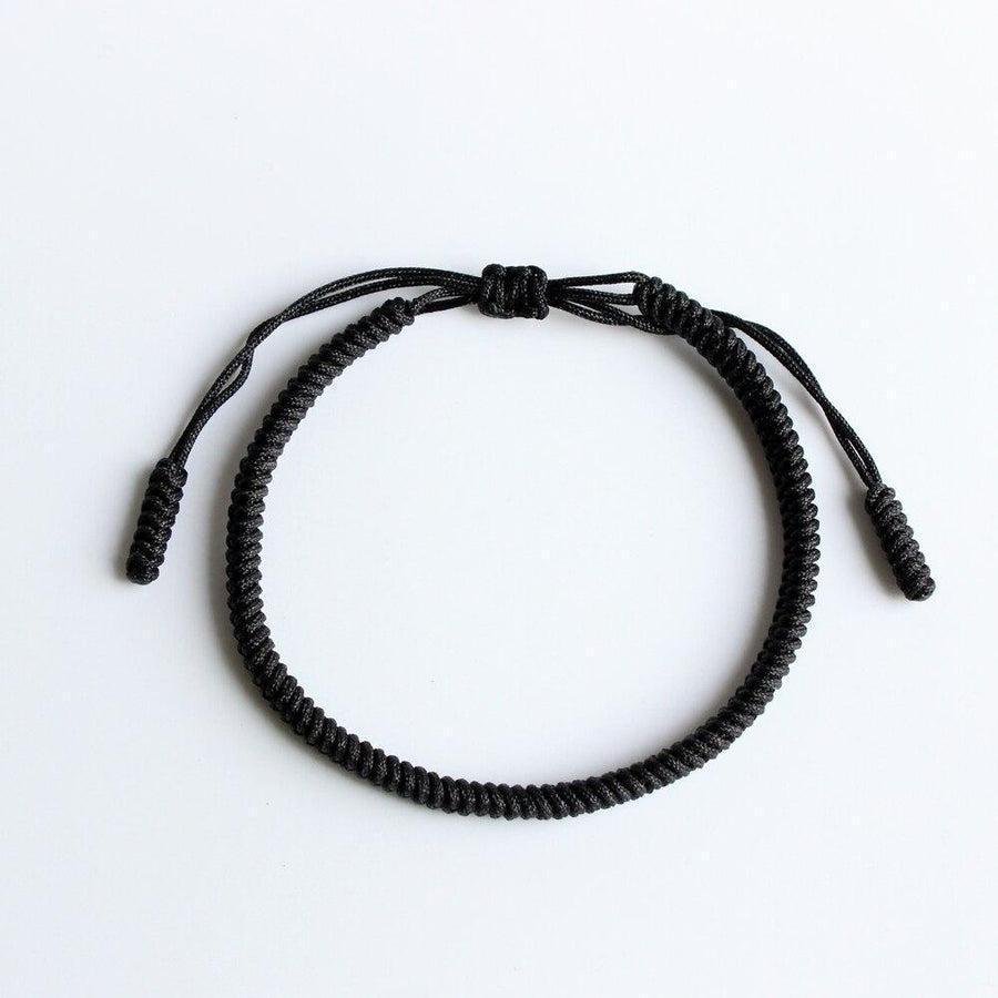 Bracelet tibétain noir avec nœud coulissant ajustable