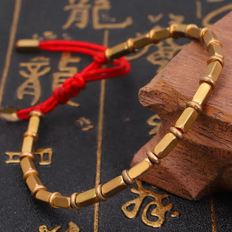 Bracelet tressé à la main avec perles intercalaires
