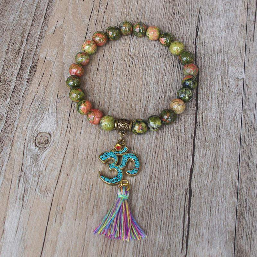 Bracelet tibétain avec perles d'Unakite et symbole Om
