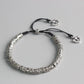 Bracelet tibétain en cuivre blanc avec mantra gravé