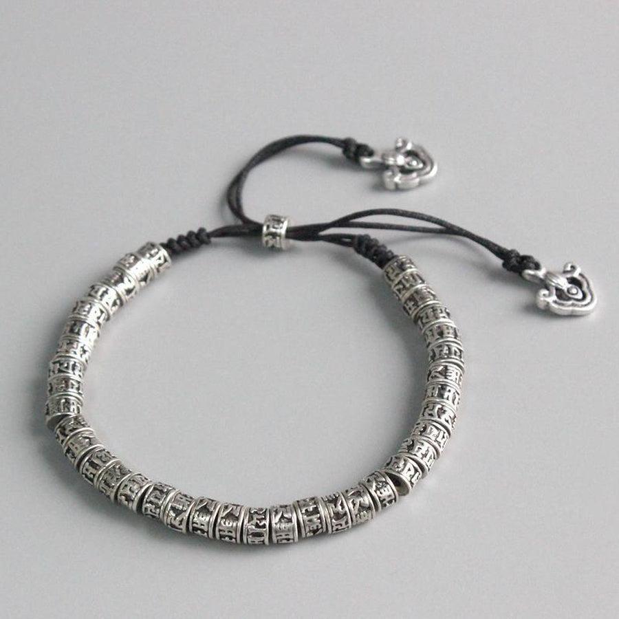 Bracelet tibétain en cuivre blanc avec mantra gravé