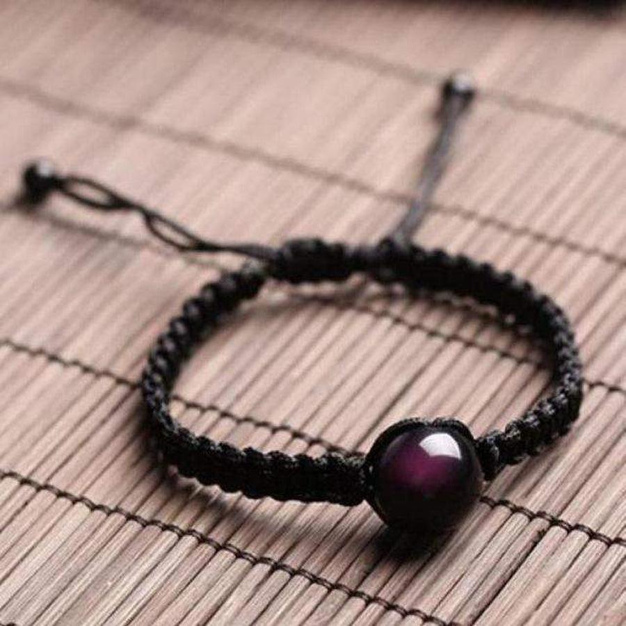 Obsidienne œil céleste sur bracelet tressé, vue rapprochée