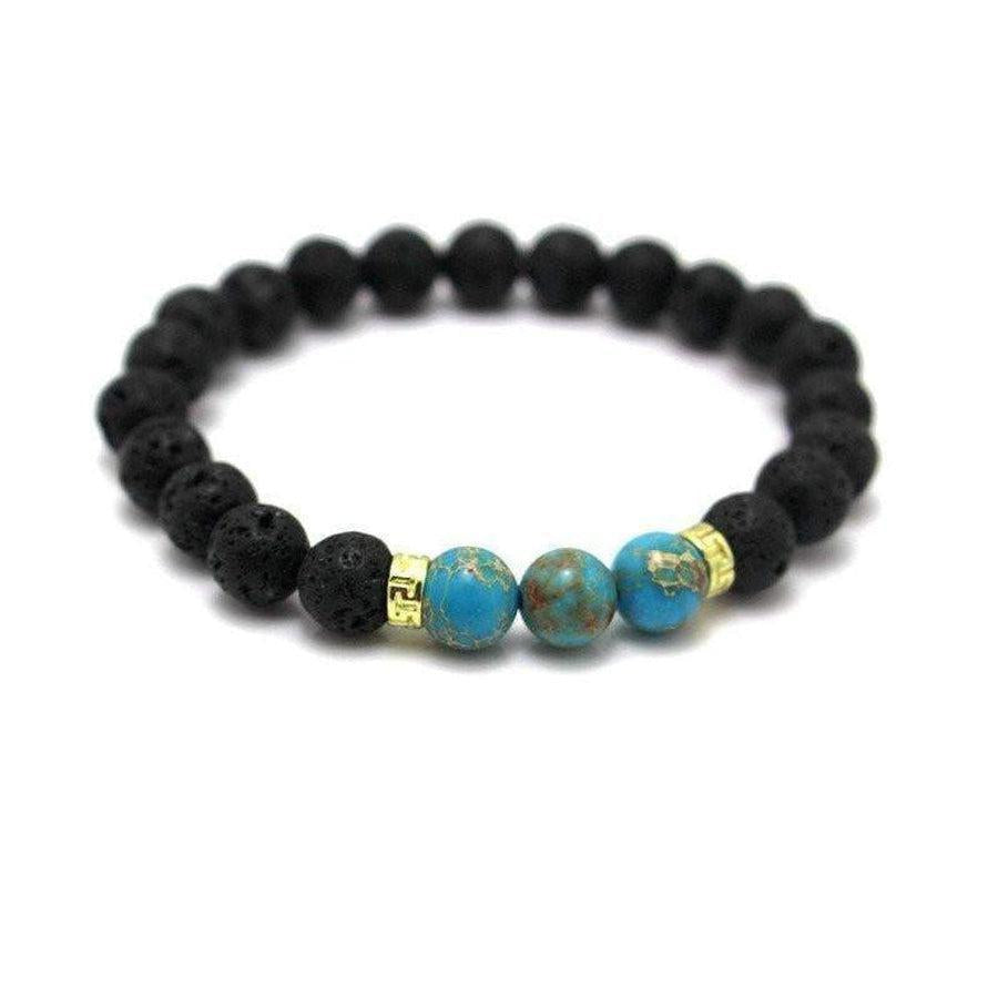 Bracelet avec pierres turquoise et lave sur fond blanc