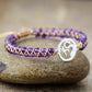 Bracelet en améthyste avec symbole Om doré