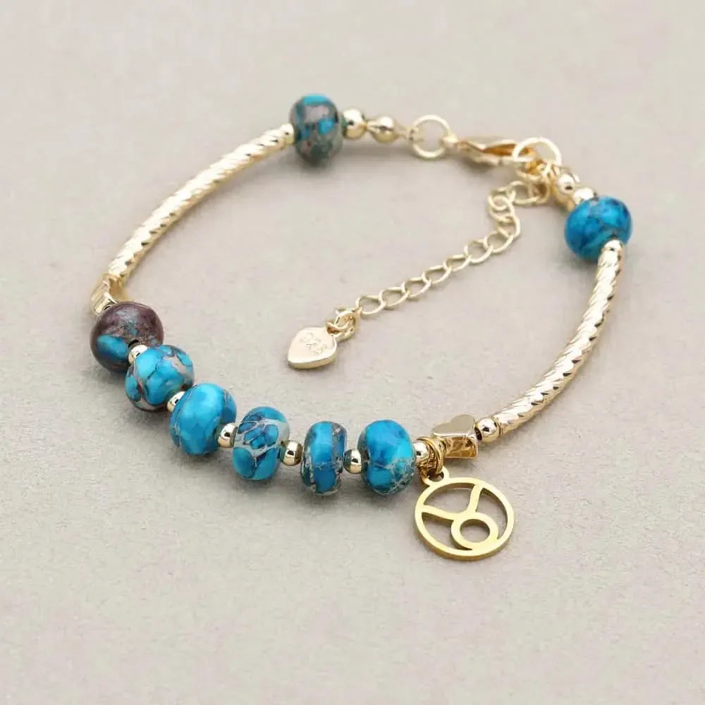 Bracelet ajustable en jaspe impérial, perles dorées et médaillon