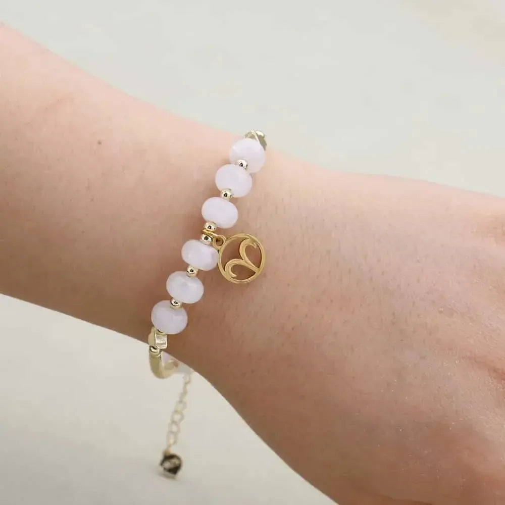 Bracelet en quartz rose avec perles dorées et médaillon zodiaque