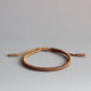 Bracelets bouddhistes alignés, vue latérale