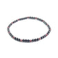 Vue rapprochée d'un bracelet de cheville avec pierres colorées