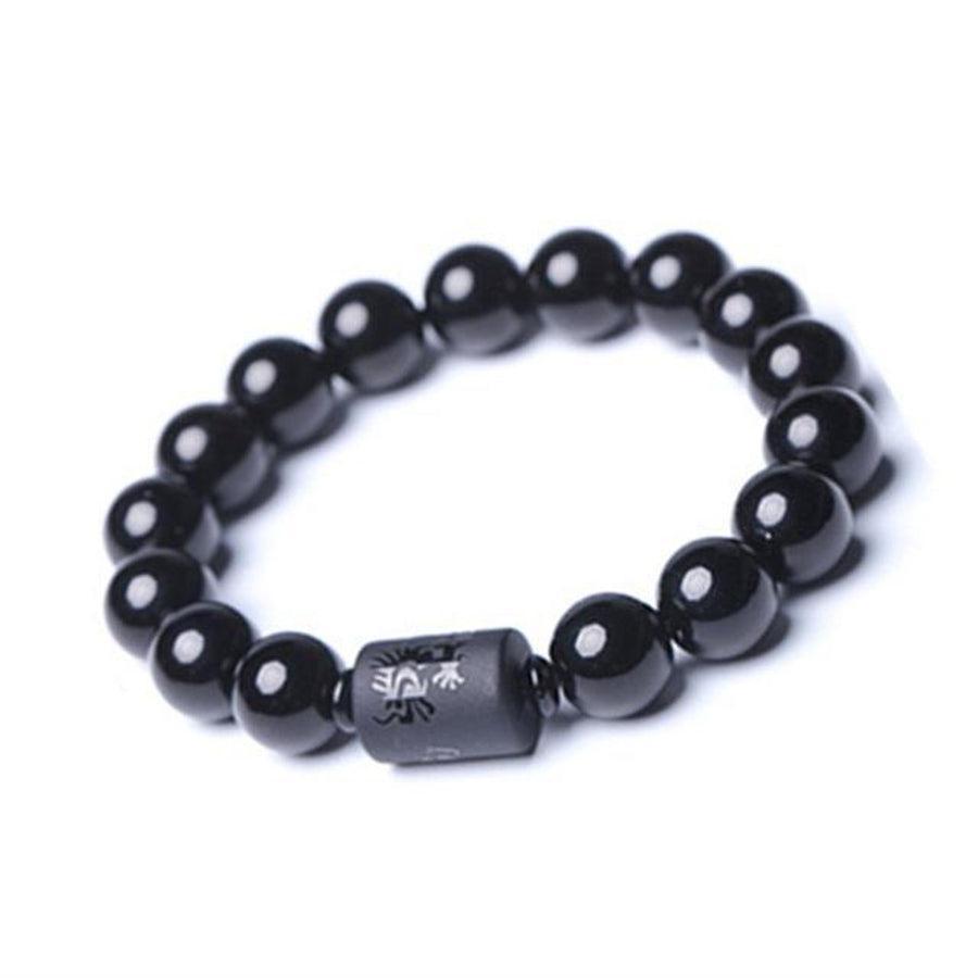 Détail des perles et gravures sur les bracelets fusion