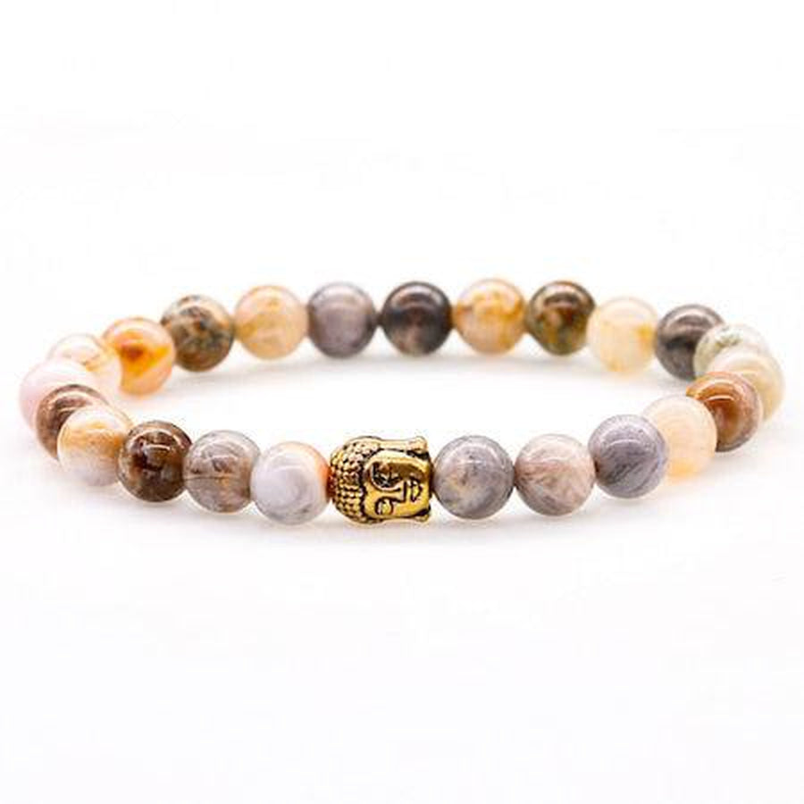 Bracelet élégant en onyx avec tête de Bouddha dorée