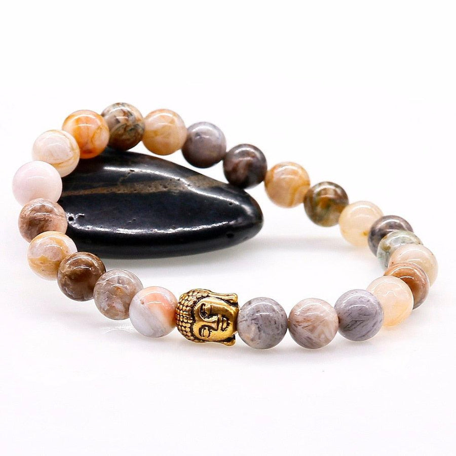 Bracelet extensible en pierres d'onyx avec Bouddha doré