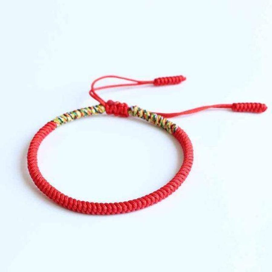 Bracelet tibétain rouge et multicolore enroulé