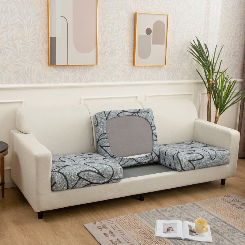 Housse extensible marron sur coussin de canapé, vue de face