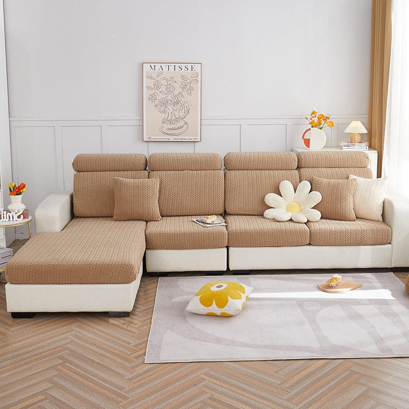 Housse polaire beige, mise en place sur canapé