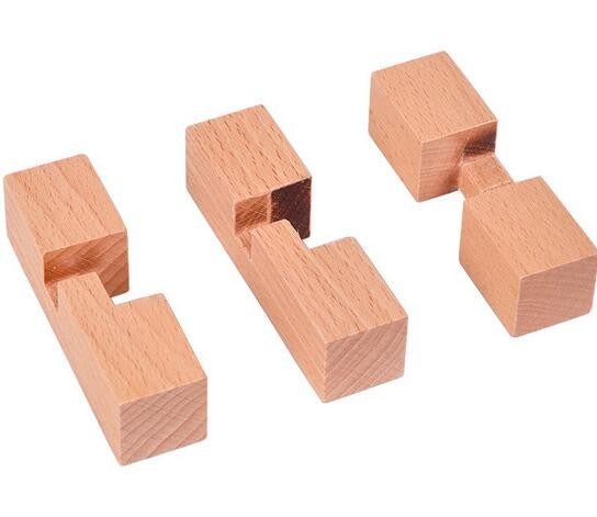 Solution du casse-tête en bois à trois pièces