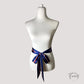 Gros plan sur les rayures rouges, blanches et bleues du foulard