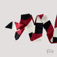 Ceinture foulard rouge et noir en tissu satiné fluide
