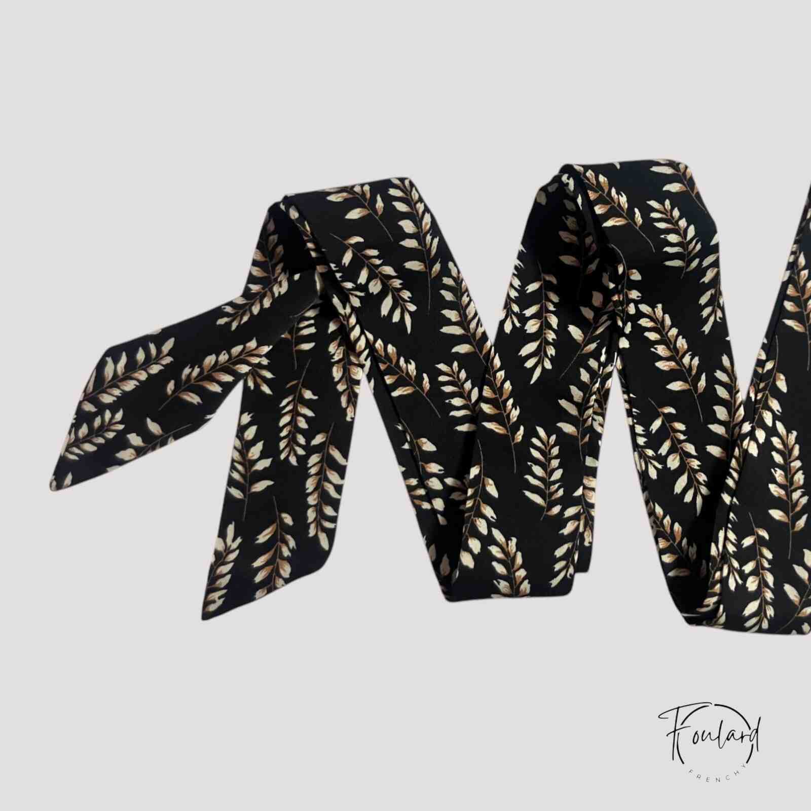 Ceinture foulard noire avec motif végétal crème